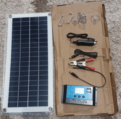 Flexible 150W solar panel with dual USB ports, ideal for outdoor adventures and car battery charging.